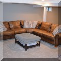 F37. Thomasville leather sectional. 33"h x 121"w x 121" x 40"d 